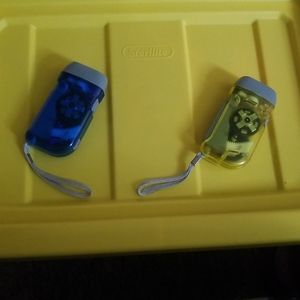 Transparent hand crank flashlight.  No batteries needed..